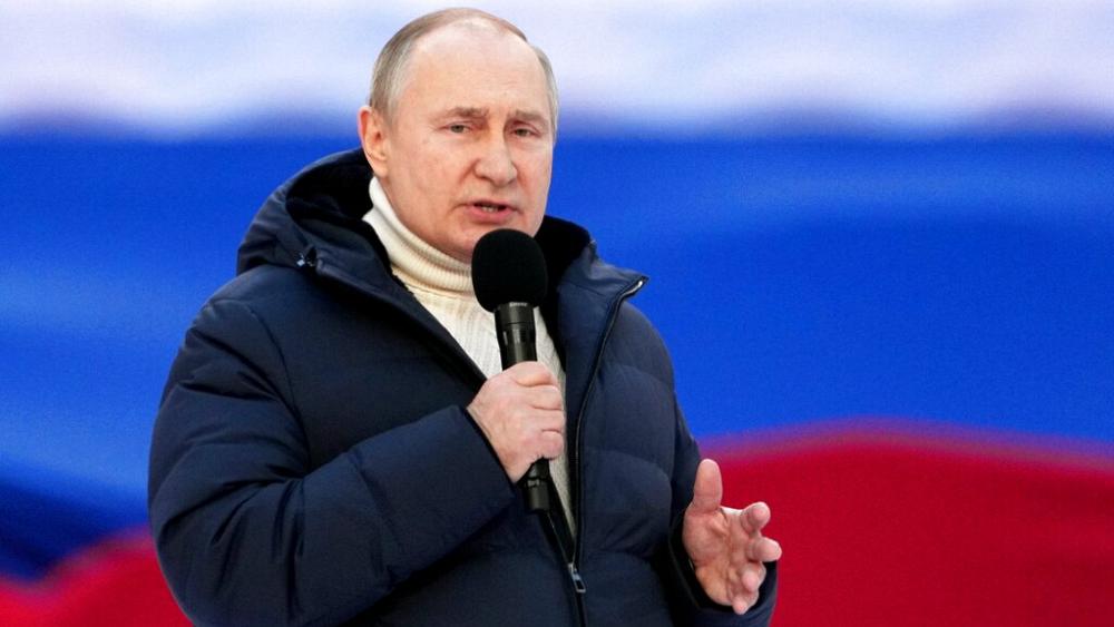 Putin broadcast interrupted at flag-waving rally in Moscow