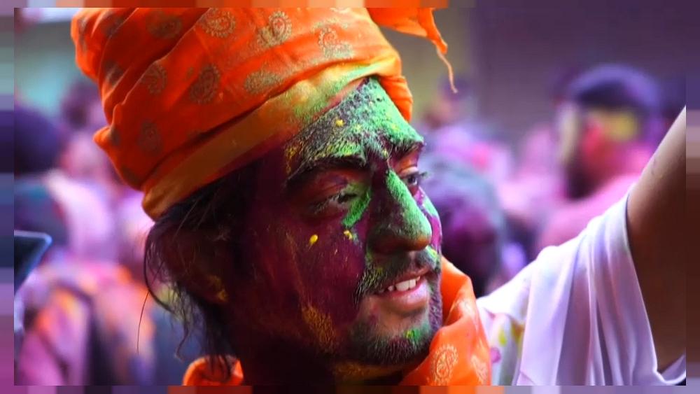 Revellers in India and Nepal celebrate colourful Holi
